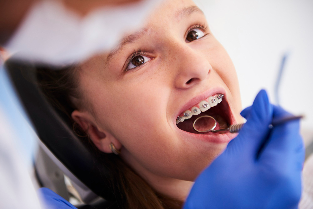 Patient receiving a routine dental braces checkup at RK Dental Practice in Chandigarh.