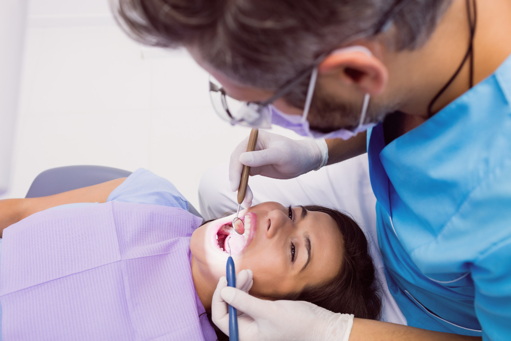 Close up of cavity filling treatment to restore a decayed tooth in Chandigarh.