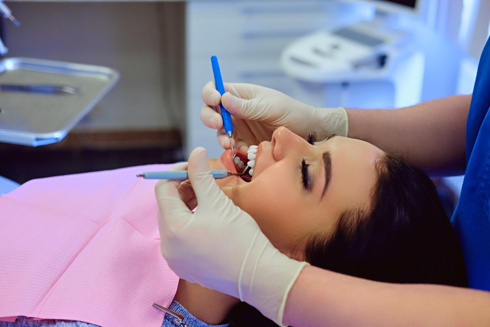 Patient receiving tooth cleaning treatment at RK Dental Practice in Chandigarh.