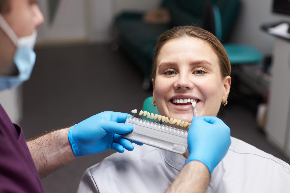 Dentist selecting the right shade for dental veneers in Chandigarh.