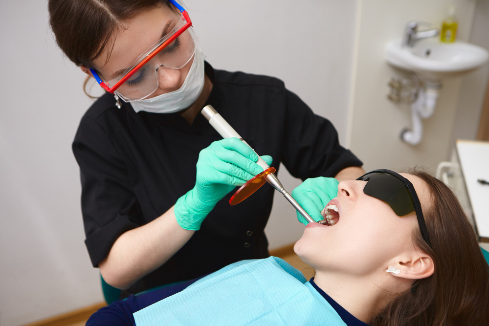Dentist performing professional teeth cleaning for a patient in Chandigarh.