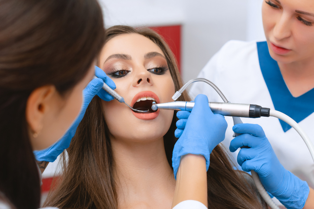 Dentist performing professional teeth cleaning for a patient in Chandigarh.