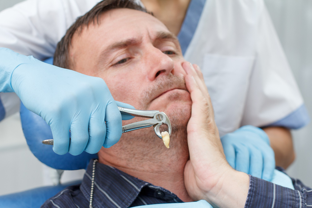 Dentist performing wisdom tooth extraction for a patient in Chandigarh.